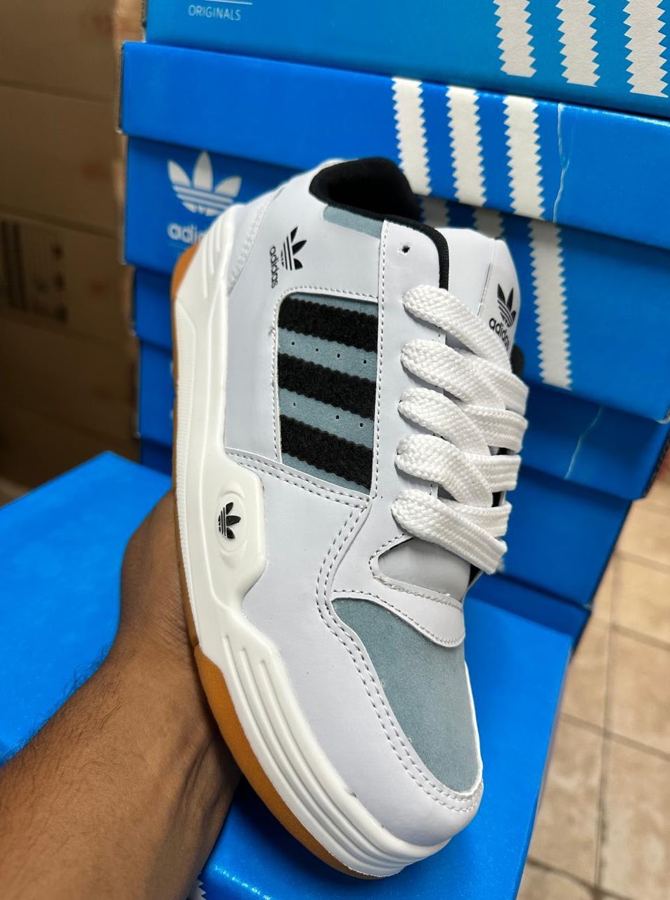 ADIDAS FORUM BLANCA Y CELESTE